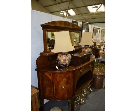 Late Victorian mahogany sideboard, with stringing and banding, raised back with a bevelled mirror plate over a shelf, bowfron