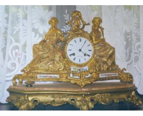 French gilt metal and porcelain mounted mantel clock, the drum flanked by figures emblematic of Industry and Commerce, white 