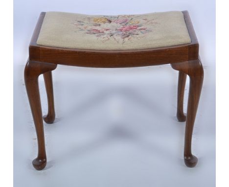 Walnut dressing table stool, needlework drop in seat, cabriole legs, width 56cm.