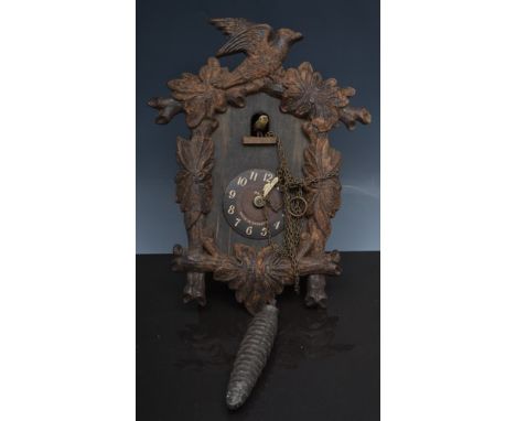 Composition Cuckoo Clock, 29cm, a walnut cased mantel clock, two other mantel clocks and an oak tray (5).