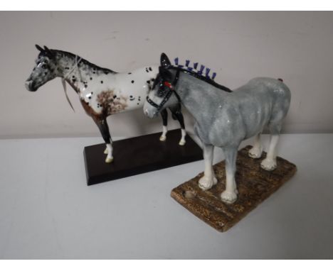 A Royal Doulton Appaloosa horse on wooden plinth together with a Royal Doulton Animals Clydesdale horse