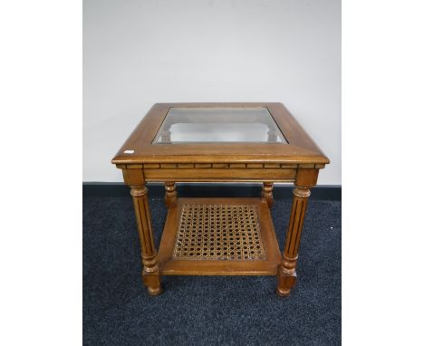 A New England two tier glass topped lamp table 