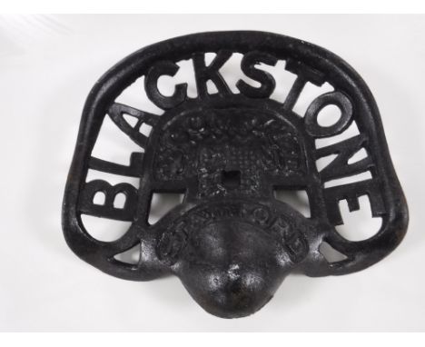 A cast metal Blackstone tractor seat