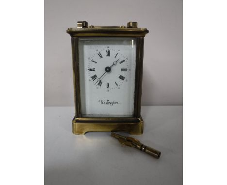 A brass cased Wellington carriage clock with key