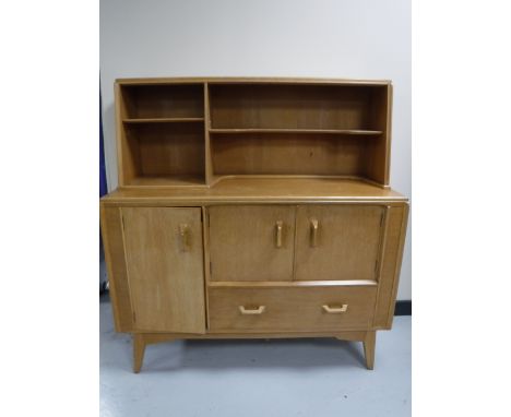 A G Plan teak sideboard  CONDITION REPORT: This measures 131cm high by 122cm wide by 46cm deep. Some light scuffs and scratch