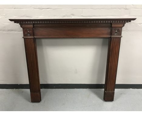 A mahogany fire surround