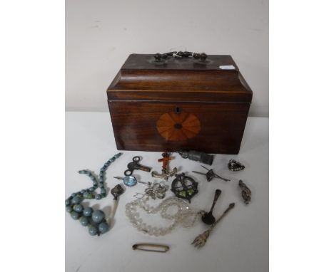 A Victorian mahogany sarcophagus tea caddy containing sterling silver jewellery, including brooches and a mustard spoon, toge