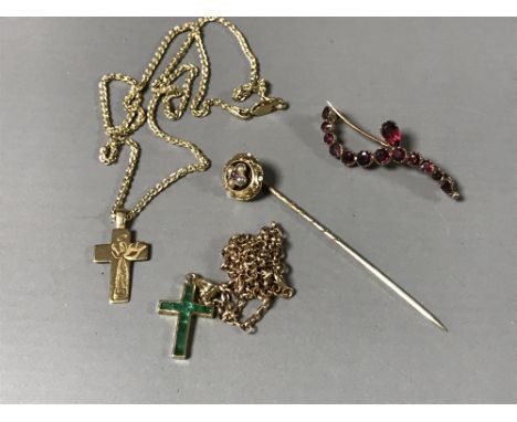 A collection of 9ct jewellery to include - a garnet brooch, green stone set crucifix and chain, Victorian stick pin, 9ct gold