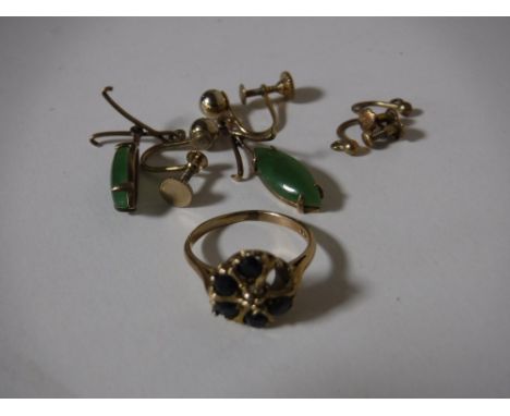 A box containing 9ct gold dress ring and a pair of 9ct gold jade earrings, together with a pair of 9ct gold earring backs