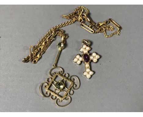 A 9ct gold Edwardian peridot pendant and chain together with a pearl and amethyst cross pendant. (2)