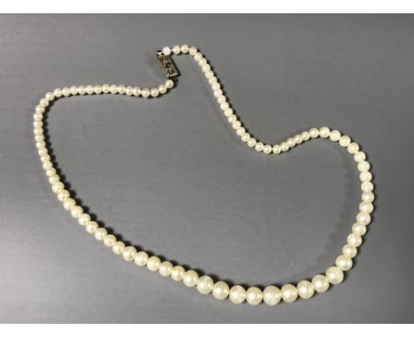 A cultured pearl necklace with sterling silver clasp