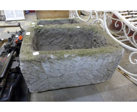 A concrete garden trough