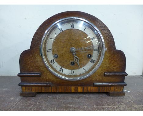 A Gofa German triple chime oak mantel clock