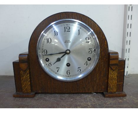 A W.H. May, Nottingham Garrard oak Westminster chime mantel clock 