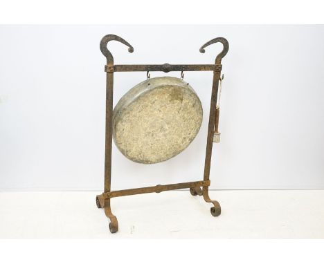 20th century Chinese gong having iron stand and scroll supports 