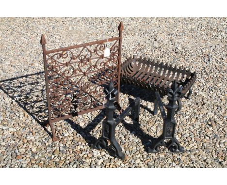 A pair of wrought iron firedogs H 42cm, a wrought iron fire basket D 28.5cm ,W 45cm and a wrought iron fire screen H 54cm