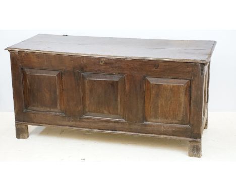 19th century oak coffer panelled chest, raised on feet, H 70cm W 145cm, D 56cm