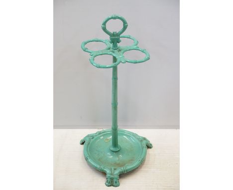 Late 19th century French aesthetic movement wrought iron umbrella / stick stand, with four enclosures above drip tray, marked