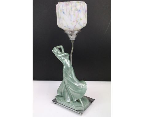 Early 20th century Art Deco table lamp, modelled as a semi nude female on chromed rectangular base and four bun feet, with 's