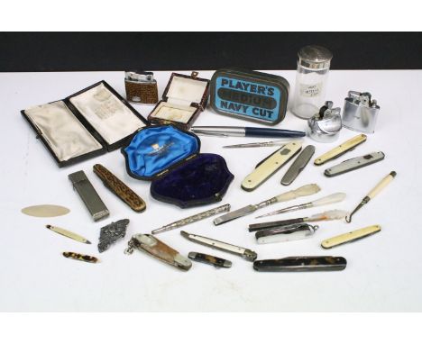 A group of mixed collectables to include pocket lighters, pocket knives and fruit knives, jewellery boxes and tobacco tin.