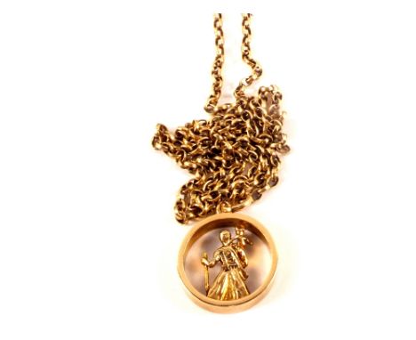 A 9ct gold St Christopher pendant on yellow metal chain