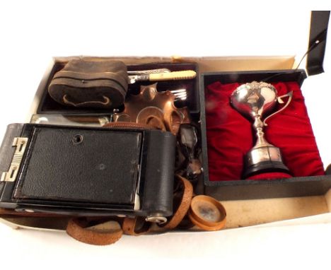 A copper ashtray inset with Georgian cartwheel penny, Kodak folding camera etc