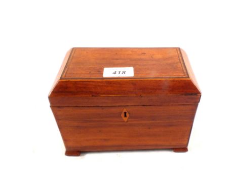 A Regency twin compartment inlaid partridge wood tea caddy with later bracket feet