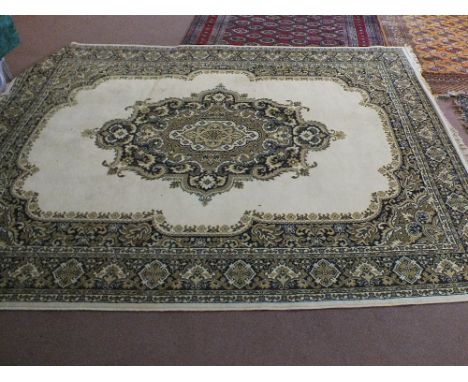 A machine made floral Persian pattern carpet