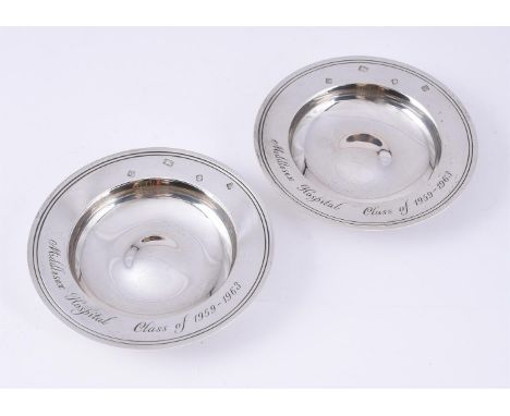 
	
		A PAIR OF SILVER ARMADA DISHES
		ASPREY LTD., LONDON 1997
		Presentation engraved
		15cm (6in) diameter
		333g (10.7 oz)