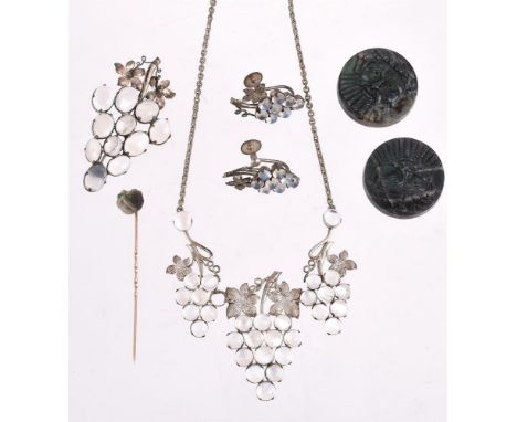 
	
		A GROUP OF MOONSTONE AND LABRADORITE JEWELLERY
		Including a necklace, earring and brooch set designed as bunches of gra