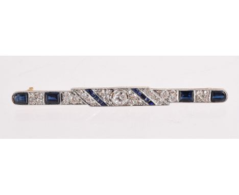 
	
		A SAPPHIRE AND DIAMOND BAR BROOCH 
		The shaped bar with calibr&#233; cut sapphires and eight cut, old and rose cut diam