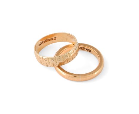 
	
		TWO GOLD COLOURED BAND RINGS   
		The first ring stamped 22 with indistinct makers mark; the second an 18 carat gold ban