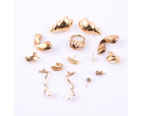 
	
		A COLLECTION OF JEWELLERY 
		To include a pair of tapered polished and shaped stud ear clips, stamped 14K; together with