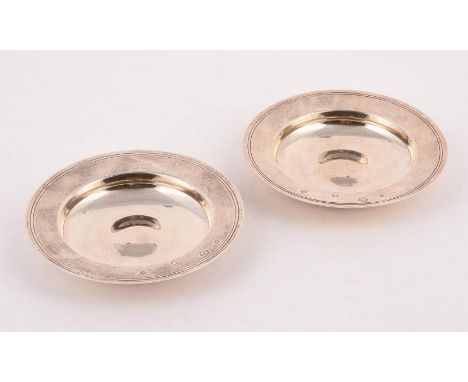 
	
		A PAIR OF SILVER ARMADA DISHES
		WILLIAM COMYNS &amp; CO., LONDON 1965
		With a reeded border
		14.5cm (5 3/4in) diamete