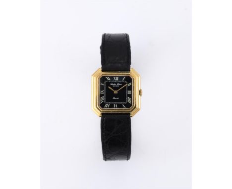 
	
		LEUBA LOUIS
		A LADY&#39;S 18 CARAT GOLD WRIST WATCH
		Movement: Swiss quartz, 6 jewels
		Case: 18 carat gold case, snap