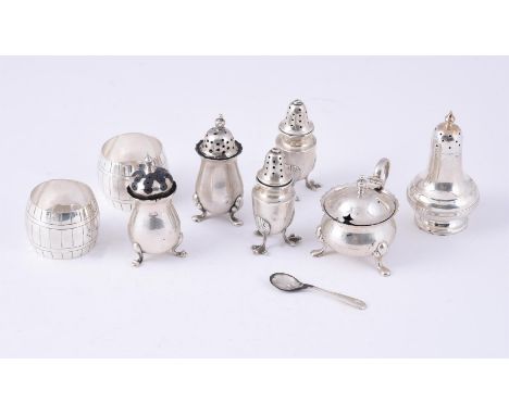 
	
		A COLLECTION OF SILVER CRUET ITEMS
		To include: a pair of Victorian barrel shaped napkin rings by Edward Hutton, London