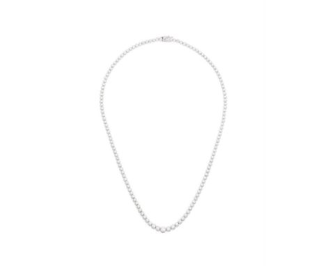 
	
		A DIAMOND LINE NECKLACE 
		Set with a graduated row of brilliant cut diamonds, mounted in 9ct white gold, partial UK hal