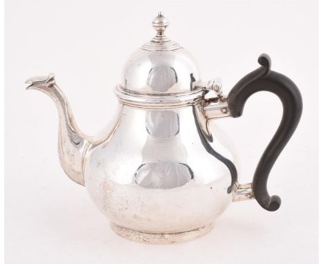 
	
		A LATE VICTORIAN SILVER BACHELOR&#39;S BALUSTER TEA POT
		CHARLES STUART HARRIS, LONDON 1900
		With an orb finial to the