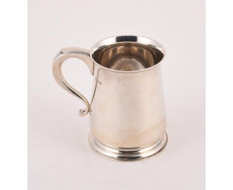 
	
		A SILVER BALUSTER MUG
		EDWARD BARNARD &amp; SONS LTD., LONDON 1930
		With a scroll handle and on a circular moulded spr