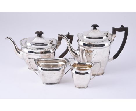 
	
		A CASED SILVER FOUR PIECE OBLONG TEA AND COFFEE SET
		MARTIN HALL &amp; CO., SHEFFIELD 1912
		The tea and coffee pots wi