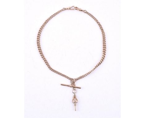 
	
		AN ALBERT CHAIN 
		The graduated gold coloured curb link Albert chain to lobster claw clasps, with T-bar attachment, sta