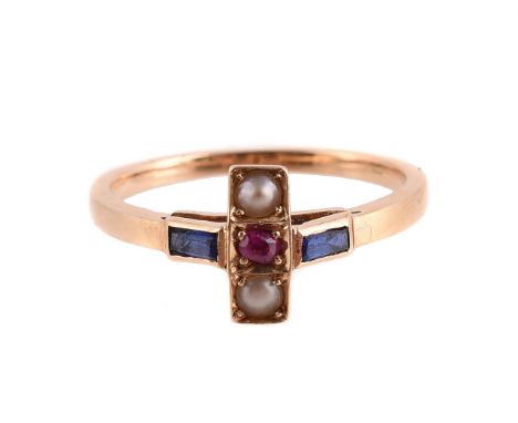 
	
		A SAPPHIRE, RUBY AND HALF PEARL DRESS RING 
		The central cross motif with half pearl terminals, centred with a circular