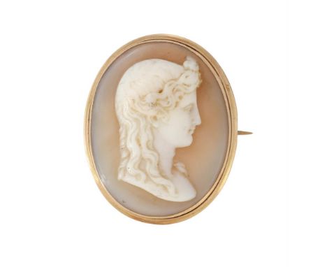 
	
		A MID 19TH SHELL CAMEO OF APOLLO WITH LATER BROOCH FITTING 
		The oval shell cameo carved with the profile of Apollo, hi