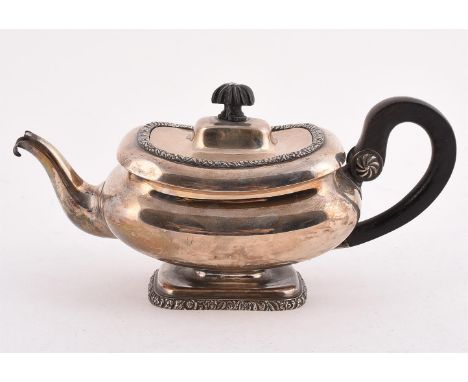 
	
		A DUTCH SILVER OBLONG BALUSTER TEA POT 
		.934 STANDARD, CIRCA 1941
		With a wooden lobed finial to the domed pull of co