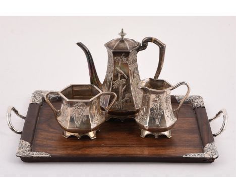 
	
		Y&nbspA CHINESE SILVER THREE PIECE HEXAGONAL BALUSTER TEA SET AND SILVER MOUNTED TRAY
		WANG HING, STAMPED 90
		With a h