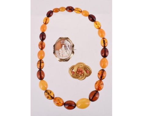 
	
		Y&nbspA SMALL GROUP OF JEWELLERY 
		Comprising a mid Victorian gold and coral looped brooch, the four intersecting loops
