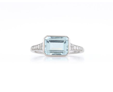 
	
		AN AQUAMARINE AND DIAMOND RING 
		The step cut aquamarine with canted corners collet set between tapered brilliant cut d