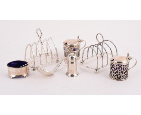 
	
		A COLLECTION OF SILVER ITEMS
		To include: a four division toast rack by Thomas Bradbury &amp; Sons, Sheffield 1927, wit