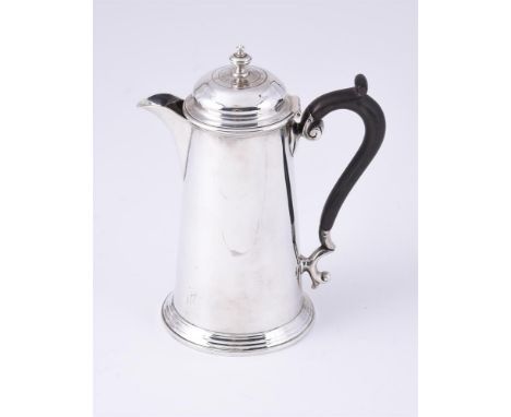 
	
		AN EDWARDIAN SILVER TAPERING HOT WATER POT
		MARTIN, HALL &amp; CO., SHEFFIELD 1905
		With a compressed finial to the do