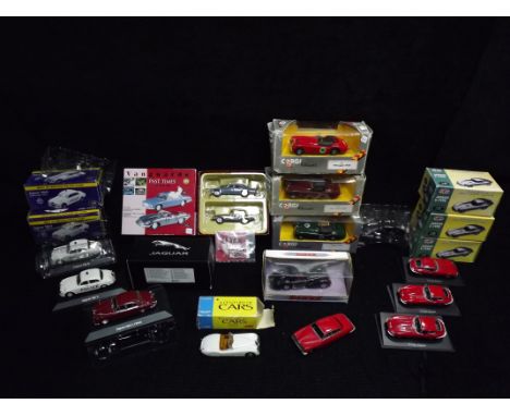 14 x Jaguar Model Cars. 3 x Atlas E Type(displayed light dust, one end flap torn), Dinky / Matchbox Delahey 145(loose in box 